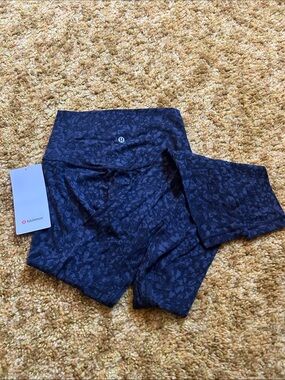 lululemon athletica black and gray leopard print leggings